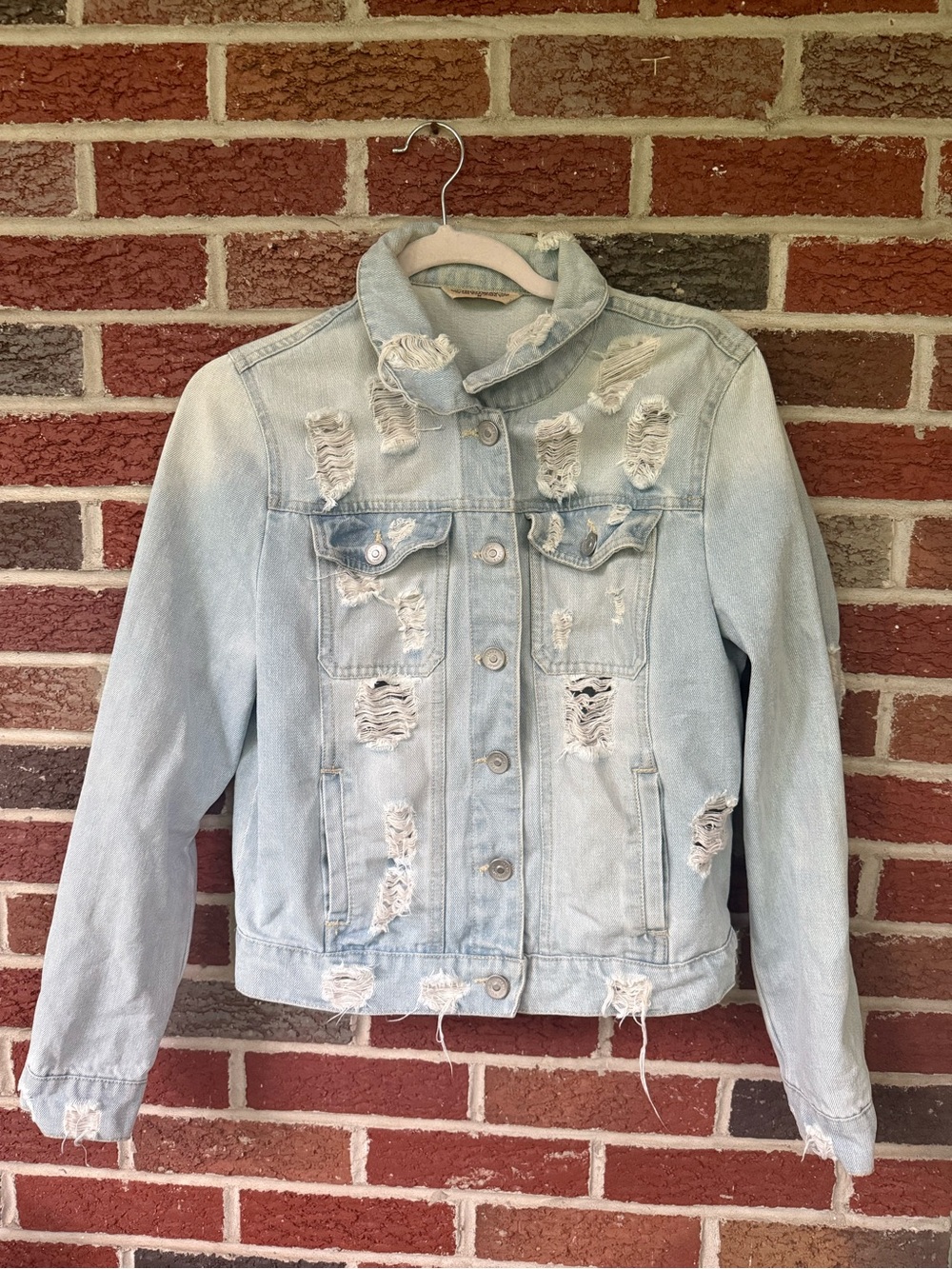 Light Wash Distressed Denim Jacket - Juniors medium